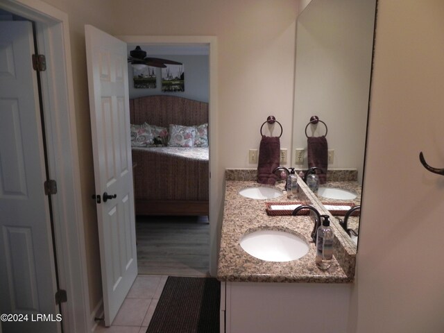 bathroom featuring vanity, tile patterned floors, and ceiling fan