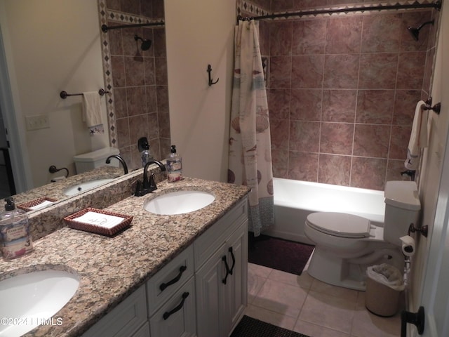 full bathroom with vanity, shower / tub combo, tile patterned flooring, and toilet