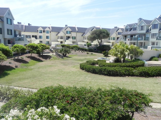 view of community with a lawn