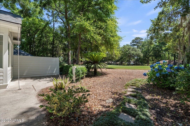 419 Bb Sams Dr, Saint Helena Island, SC 29920 - view of yard with view of wooded area