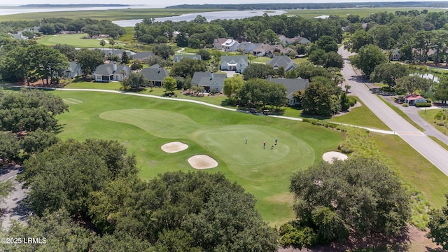 419 Bb Sams Dr, Saint Helena Island, SC 29920 - aerial perspective of suburban area featuring a nearby body of water and a local golf course
