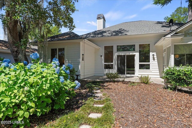 419 Bb Sams Dr, Saint Helena Island, SC 29920 - back of house featuring a chimney