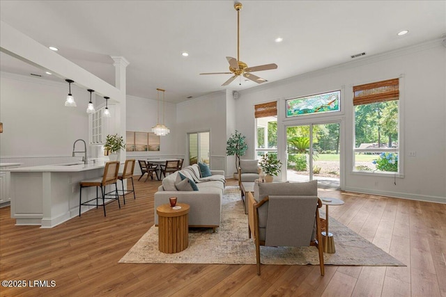 419 Bb Sams Dr, Saint Helena Island, SC 29920 - living room with ceiling fan, ornamental molding, light wood-type flooring, and recessed lighting
