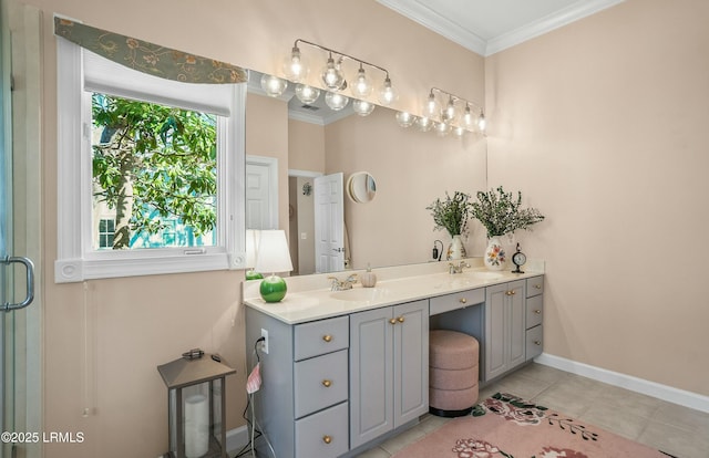 bathroom with tile patterned flooring, crown molding, and vanity