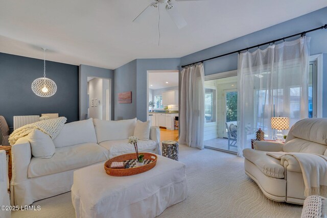 15 Padgett Dr, Bluffton, SC 29909 - living room featuring ceiling fan and light carpet