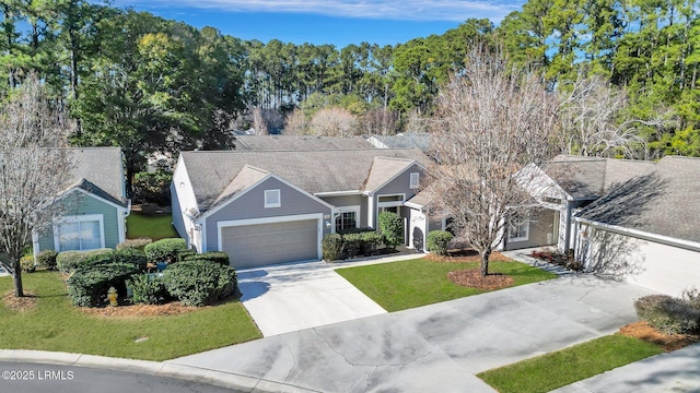 15 Padgett Dr, Bluffton, SC 29909 - view of front of house featuring a garage and a front lawn