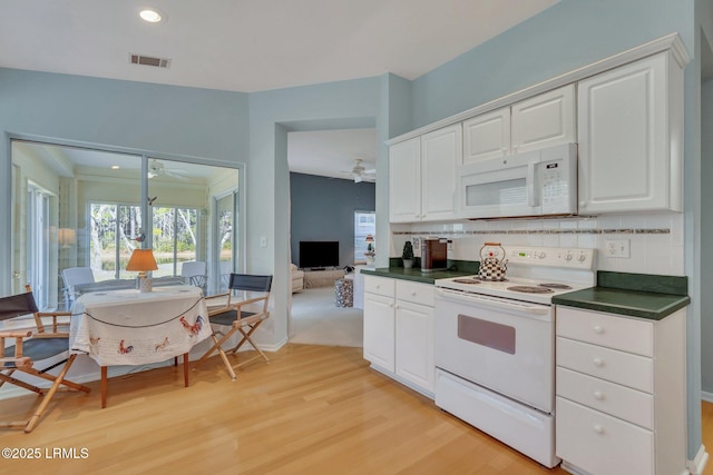 15 Padgett Dr, Bluffton, SC 29909 - kitchen featuring white cabinetry, ceiling fan, white appliances, light hardwood / wood-style floors, and decorative backsplash