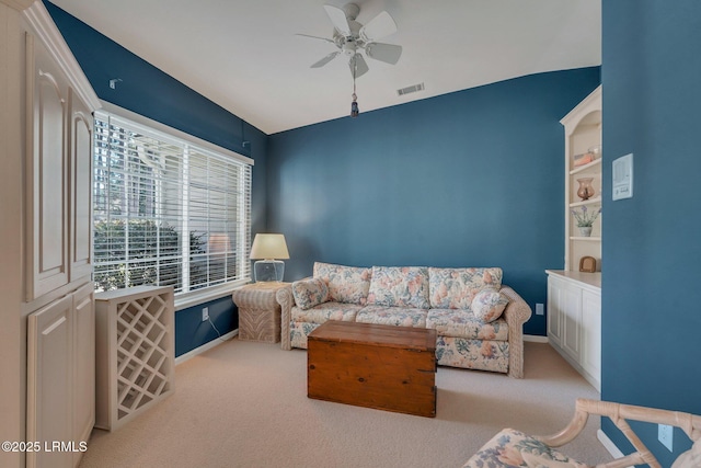 15 Padgett Dr, Bluffton, SC 29909 - carpeted living room with ceiling fan and vaulted ceiling
