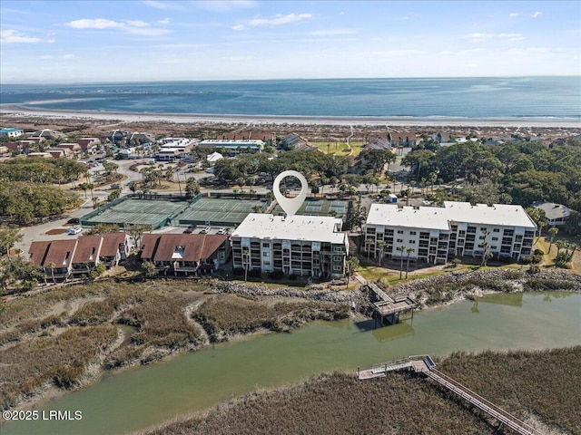 drone / aerial view with a water view