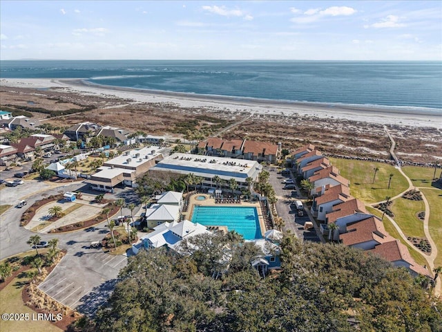 bird's eye view with a view of the beach and a water view