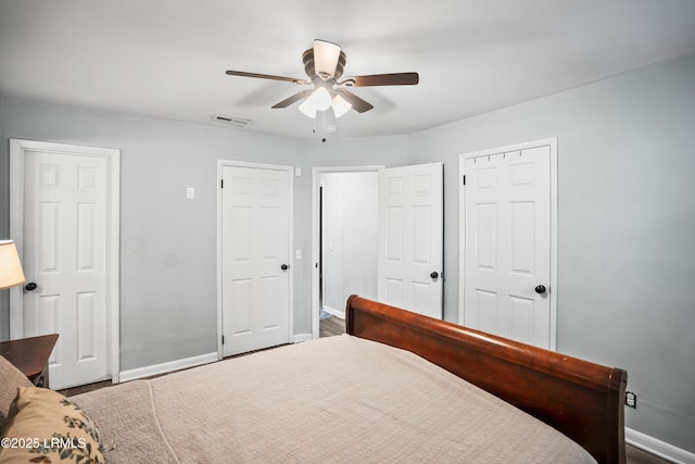 bedroom with baseboards and a ceiling fan