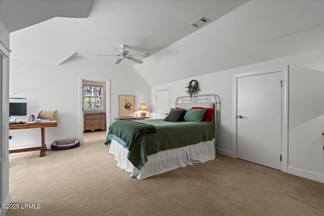 carpeted bedroom featuring lofted ceiling and ceiling fan