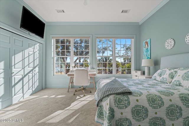 bedroom featuring light carpet and ornamental molding