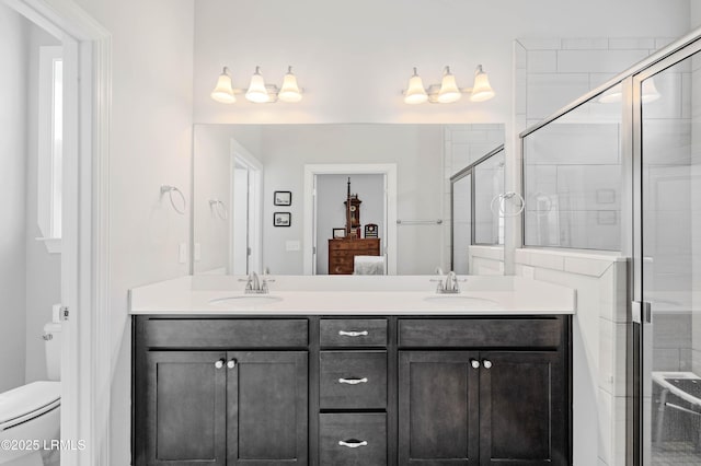 2712 Bluestem Dr, Beaufort, SC 29902 - full bathroom with a sink, a shower stall, double vanity, and toilet