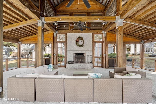 2712 Bluestem Dr, Beaufort, SC 29902 - living room featuring high vaulted ceiling, ceiling fan, and an outdoor stone fireplace