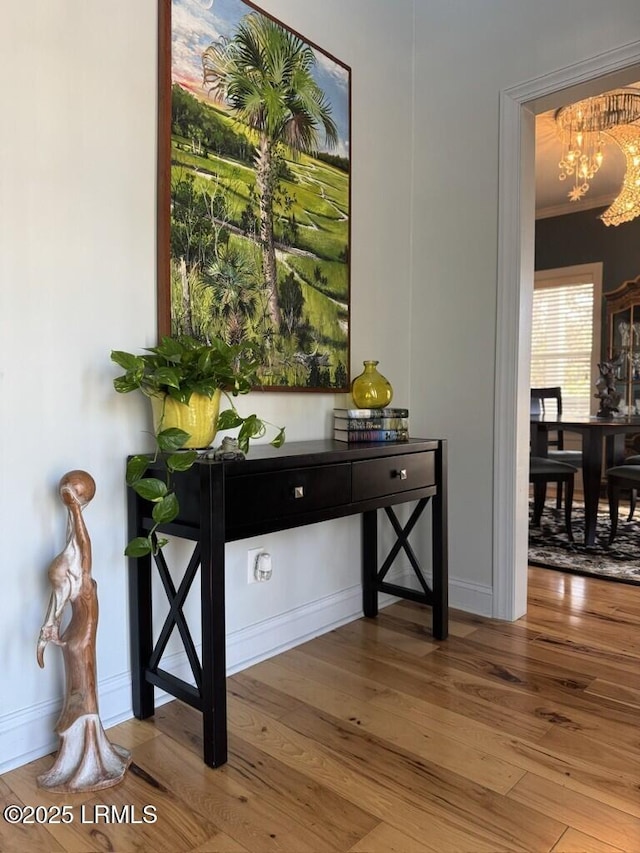 1118 Otter Cir, Beaufort, SC 29902 - interior space featuring wood finished floors, an inviting chandelier, and baseboards
