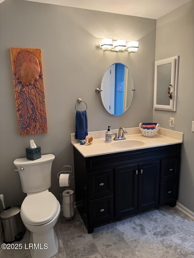 1118 Otter Cir, Beaufort, SC 29902 - bathroom featuring vanity, baseboards, and toilet