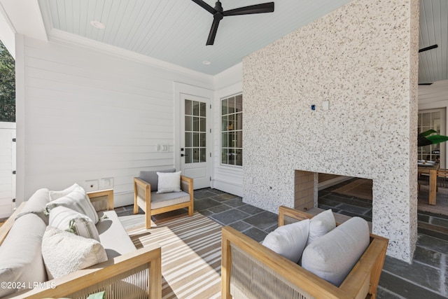 exterior space with wood ceiling and ceiling fan