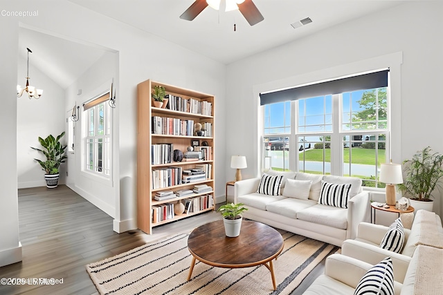 1 Broadland Cir, Bluffton, SC 29910 - living area with ceiling fan, wood finished floors, a chandelier, and lofted ceiling