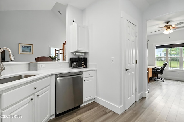 1 Broadland Cir, Bluffton, SC 29910 - kitchen featuring stainless steel dishwasher, light wood-style floors, white cabinetry, a ceiling fan, and a desk