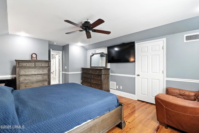 1 Broadland Cir, Bluffton, SC 29910 - bedroom featuring hardwood / wood-style floors, ceiling fan, and connected bathroom