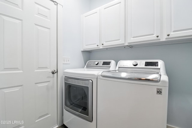 1 Broadland Cir, Bluffton, SC 29910 - laundry room with cabinet space and washer and clothes dryer