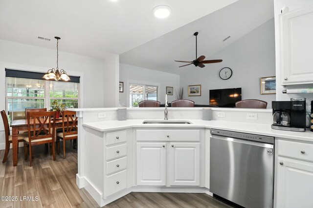 1 Broadland Cir, Bluffton, SC 29910 - kitchen with dishwasher, ceiling fan, light wood-style floors, light countertops, and vaulted ceiling