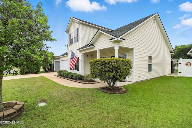 1 Broadland Cir, Bluffton, SC 29910 - view of side of home featuring a garage, a shingled roof, a lawn, and concrete driveway