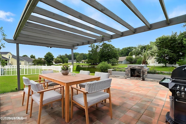 1 Broadland Cir, Bluffton, SC 29910 - view of patio / terrace featuring a grill, outdoor dining space, a pergola, and an outdoor stone fireplace