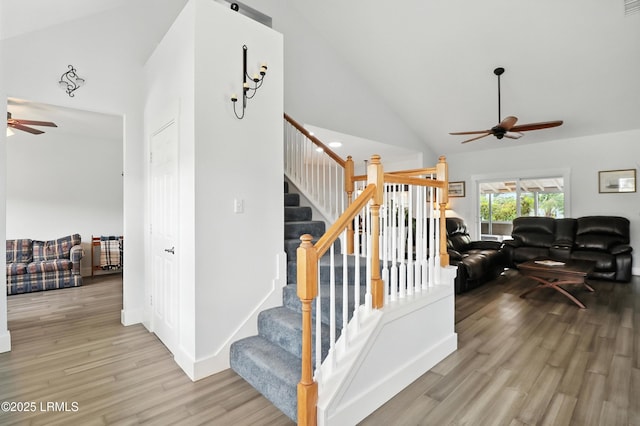 1 Broadland Cir, Bluffton, SC 29910 - staircase with a ceiling fan, wood finished floors, and high vaulted ceiling