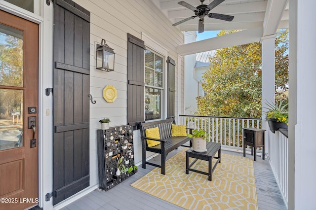 exterior space featuring a porch and a ceiling fan