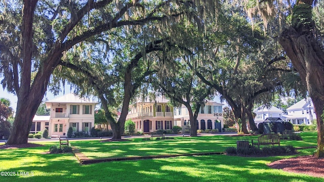 surrounding community with a lawn