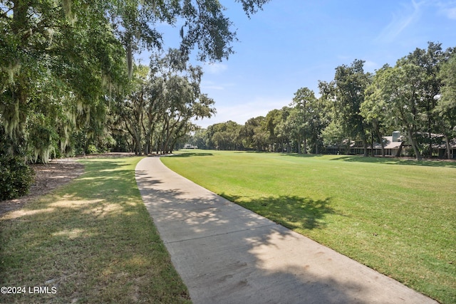 view of community featuring a lawn