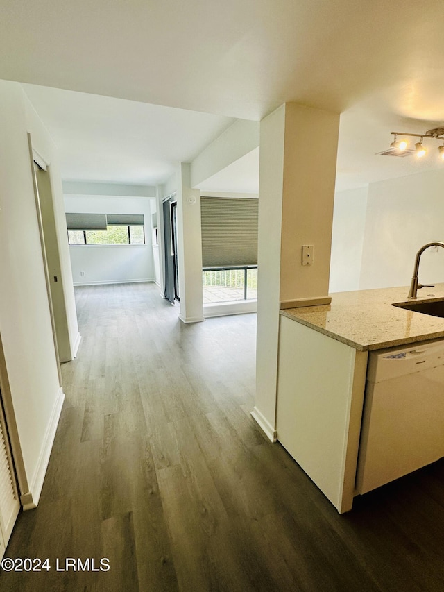 hall featuring hardwood / wood-style flooring and sink