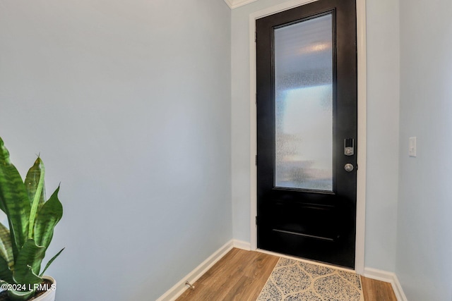 doorway to outside featuring light wood-type flooring