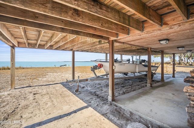 view of patio with a water view