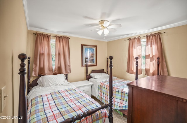 bedroom with multiple windows, crown molding, and ceiling fan