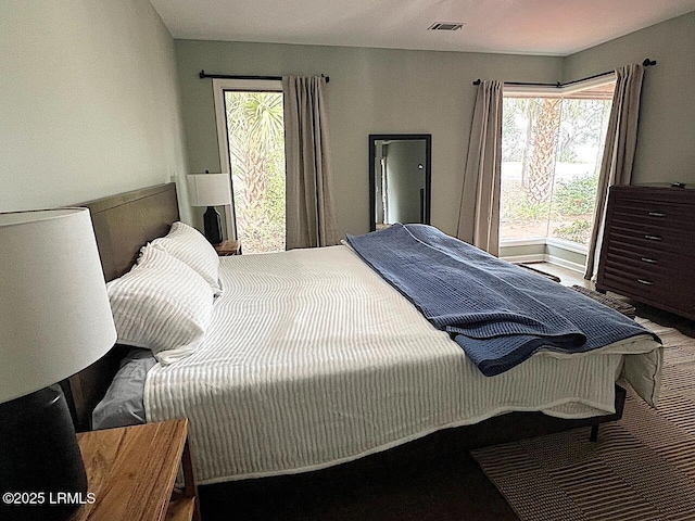 bedroom with visible vents