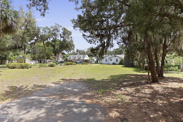 1413 Pigeon Point Rd, Beaufort, SC 29902 - view of grassy yard with a residential view