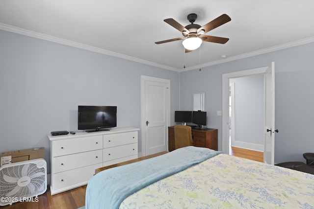1413 Pigeon Point Rd, Beaufort, SC 29902 - bedroom featuring ornamental molding, wood finished floors, and a ceiling fan