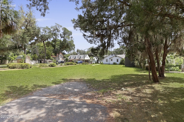 1413 Pigeon Point Rd, Beaufort, SC 29902 - view of green lawn with a residential view
