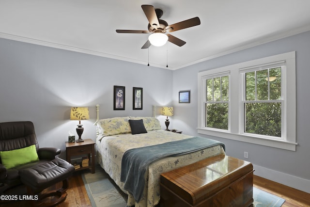 1413 Pigeon Point Rd, Beaufort, SC 29902 - bedroom featuring wood finished floors, crown molding, baseboards, and ceiling fan