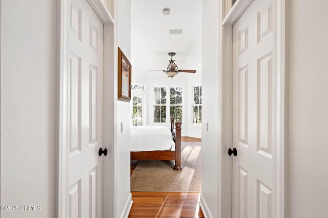 104 Barnaby Blf, Seabrook, SC 29940 - hall with wood finished floors and baseboards