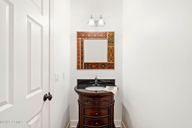 104 Barnaby Blf, Seabrook, SC 29940 - bathroom with vanity and baseboards