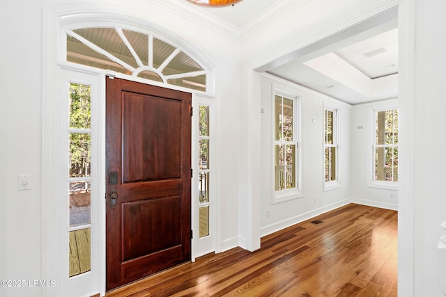 104 Barnaby Blf, Seabrook, SC 29940 - foyer with wood finished floors, healthy amount of natural light, and crown molding