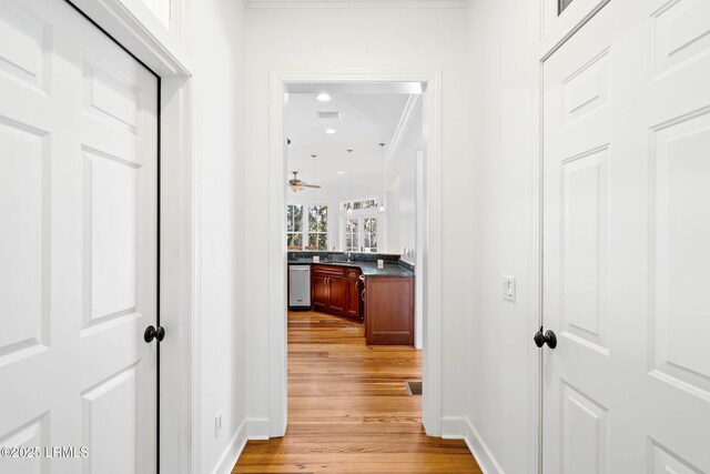 104 Barnaby Blf, Seabrook, SC 29940 - corridor with light wood-style floors, crown molding, and recessed lighting