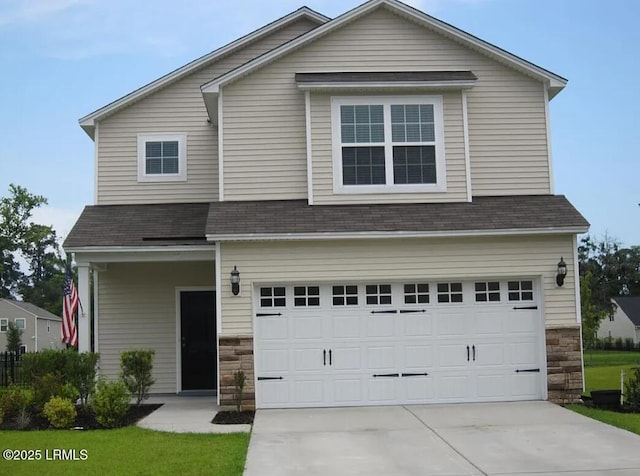 11 Seneca Way, Beaufort, SC 29906 - view of front of home with stone siding, roof with shingles, driveway, and an attached garage