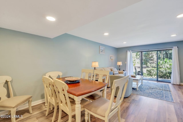 dining area with light wood-type flooring