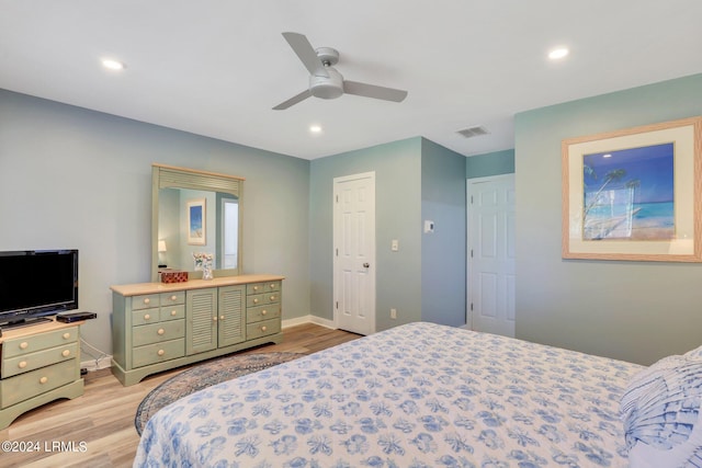 bedroom featuring ceiling fan and light wood-type flooring