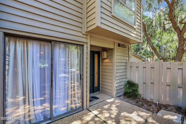 entrance to property with a patio area